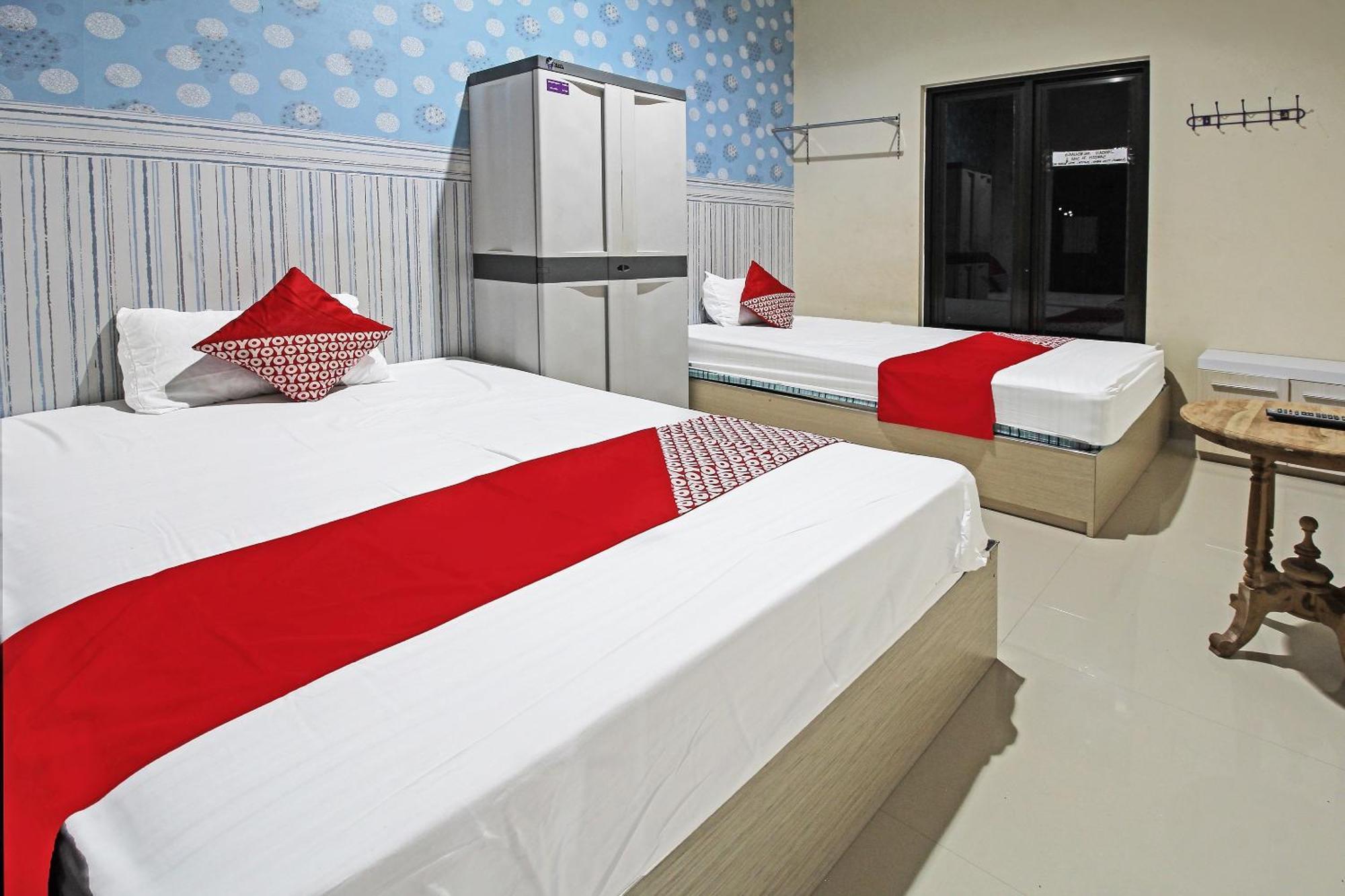 Super Oyo 91202 Family Syariah Hotel